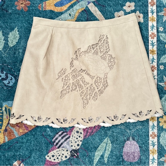 Faux leather mini skirt with lace-look cutouts - Picture 1 of 6